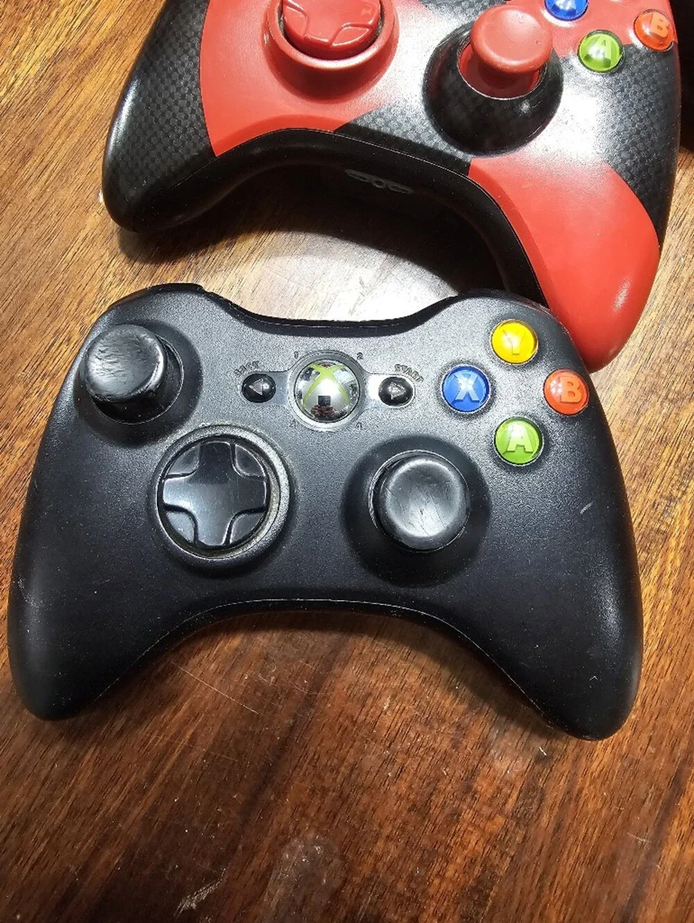 Lot Of Three Xbox 360 Wireless Controllers - Black and Red Variants